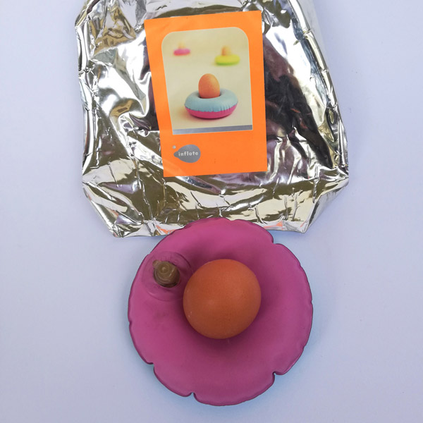 Inflatable egg cup and silver packaging