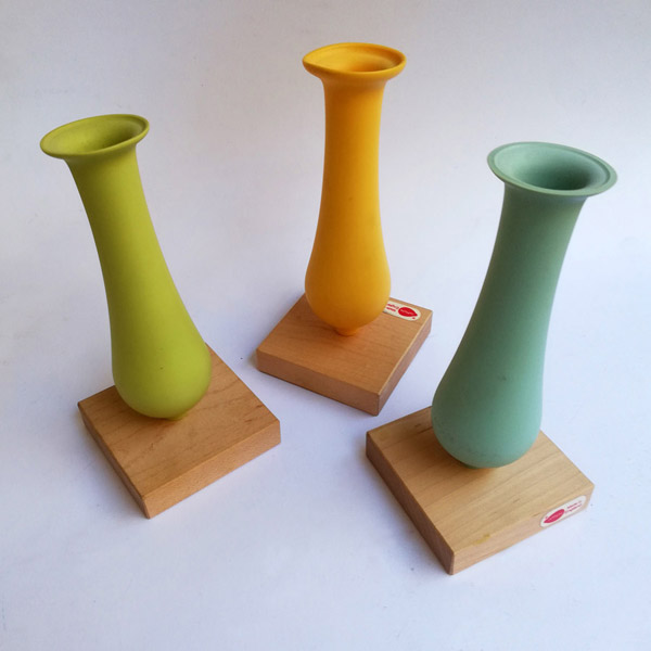 Three dip moulded plastic vases