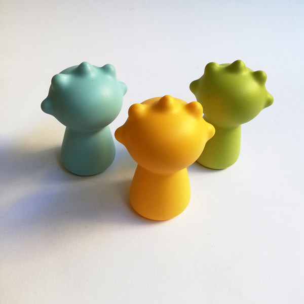 Three dip moulded plastic bottle tops