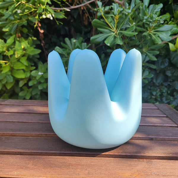 Blue dip moulded plastic bowl.