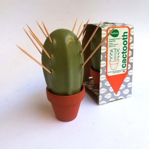 Olive dip moulded plastic toothpick holder with ceramic base.