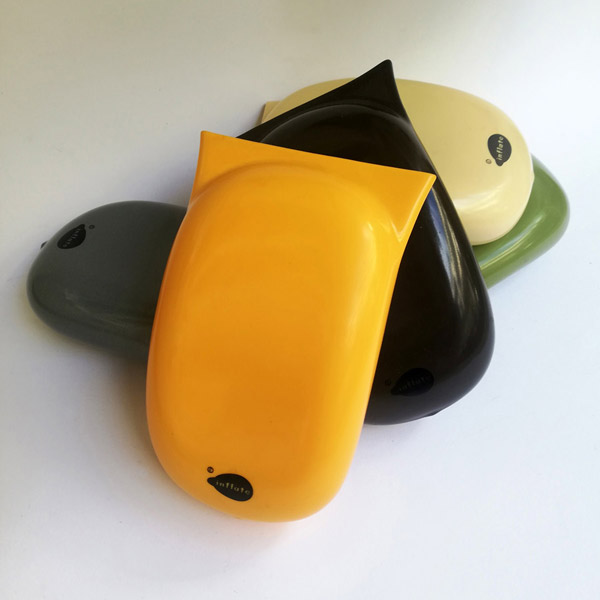 Five dip moulded plastic sunglass cases in different colours..