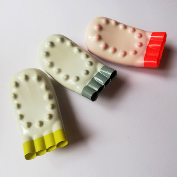 Three dip moulded plastic soap holders.