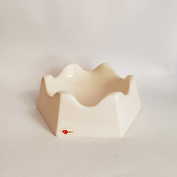 White plastic hexagonal bowl.