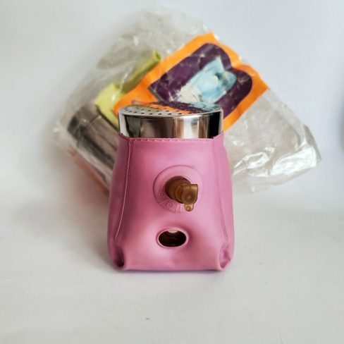 Metal sugar shaker with magenta inflatable sleeve